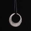REACTION MOBIUS NECKLACE - STAINLESS STEEL | on black cord